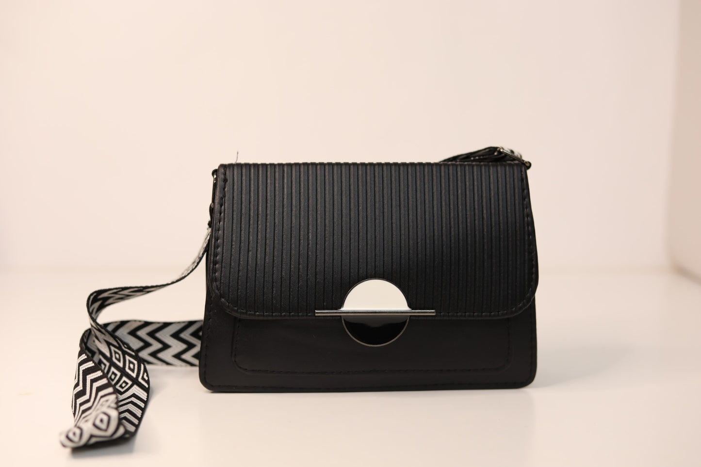Black Crossbody Handbag with Geometric Strap