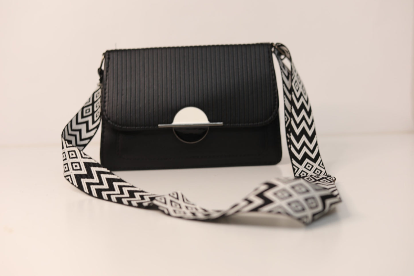 Black Crossbody Handbag with Geometric Strap